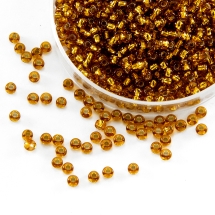 Бисер 17090 Чешский Preciosa 10/0, Прозрачный с серебряной полосой TSL, Золотой, Круглый, (УТ0001973)