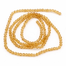 Намистини Австрійський Кришталь, Імітація, Скло, Грановані Біконус, Колір: Золотистий, Розмір: 2х3мм, Отв-тя: 0.5мм, близько 200 шт / 42см / нитка, (УТ0005883)