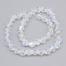 Намистини Австрійський Кришталь Клас АА, Імітація, Біконус, Гальваніка АВ-колір, Колір: Безбарвний Бензин, Розмір: 6х6мм, Отвір: 1мм, близько 50шт/30см/нитка, (УТ0031052)