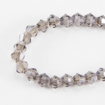 Намистини Гальваніка Скло, Грановані, Біконус, Колір: Сірий, Розмір: 3х3мм, Отв-тя: 1мм, близько 136шт / 42см / нитка, (УТ100007043)